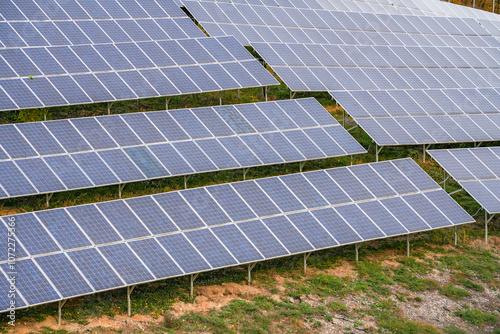 Solar panels on the hill in countryside, during autumn season	