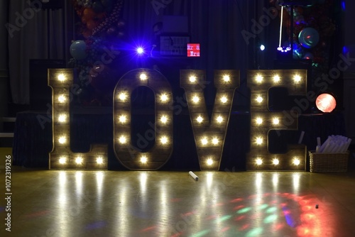 Love sign at British wedding dance floor.