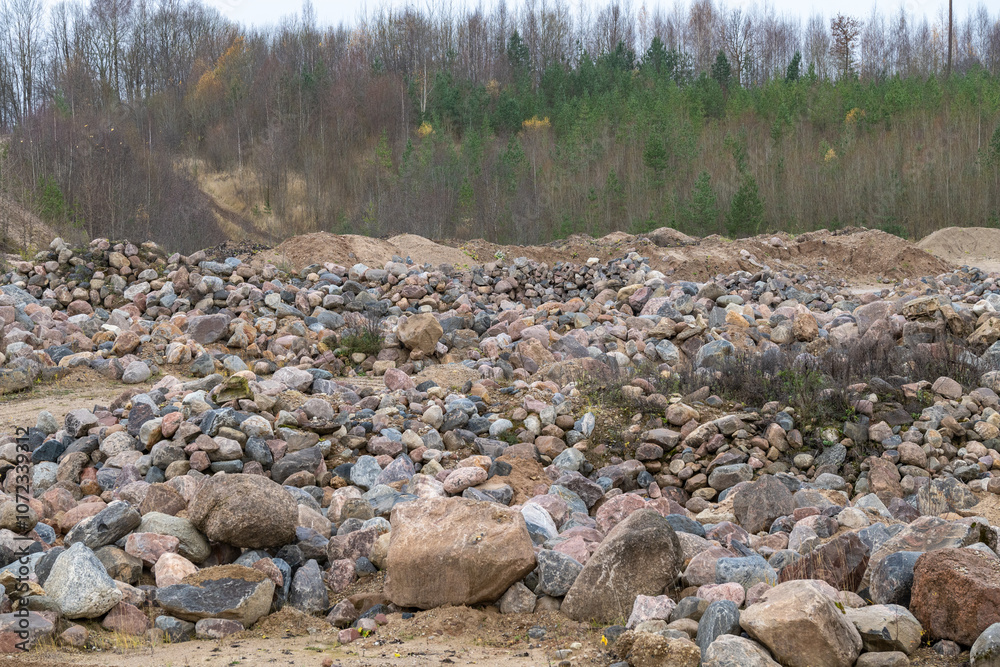 Boulders in a sand quarry. Pile of Rocks Boulders for Construction Boulders in a sand quarry. Pile of Rocks Boulders for Construction
