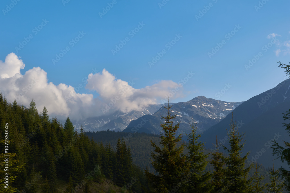 A cloud wave over the Parang Mountains in Romania A cloud wave over the Parang Mountains in Romania
