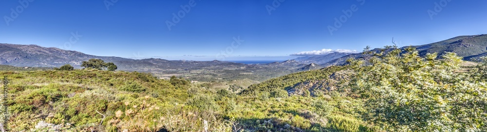 Panoramic view of Cap Corse coast from the mountains with the sea in the background Panoramic view of Cap Corse coast from the mountains with the sea in the background