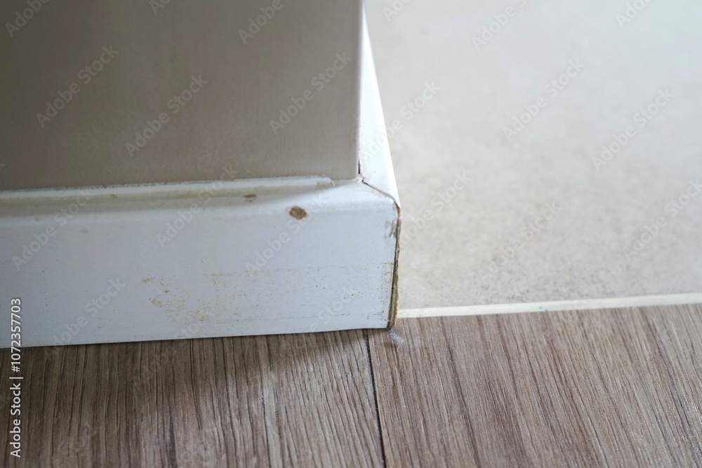 Damaged by humidity skirting base board on corner. High humidity wet place home Damaged by humidity skirting base board on corner. High humidity wet place home