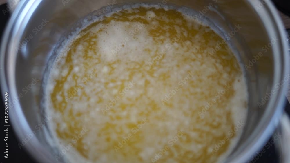 making ghee butter boiling in pot healthy nutritious eco made at home yellow making ghee butter boiling in pot healthy nutritious eco made at home yellow