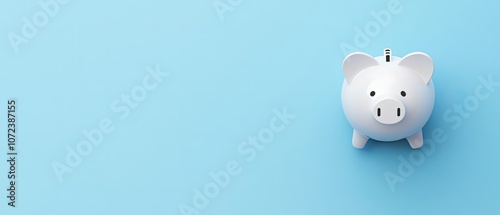 White piggy bank on blue background.