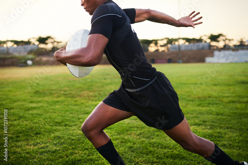 Hands, energy and player with ball, rugby and training for match, performance and athlete with fitness. Outdoor, action and person in stadium, professional and preparing for competition and field