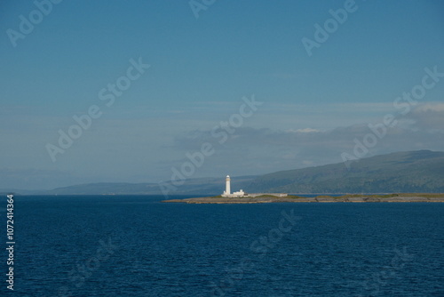 lighthouse on the scottish seafront, isle of mull iona