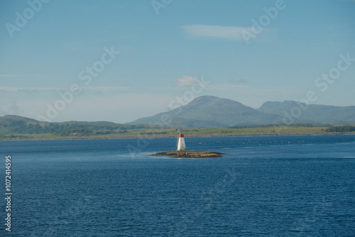 lighthouse on the scottish seafront, isle of mull iona
