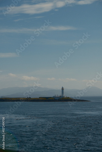 lighthouse on the scottish seafront, isle of mull iona