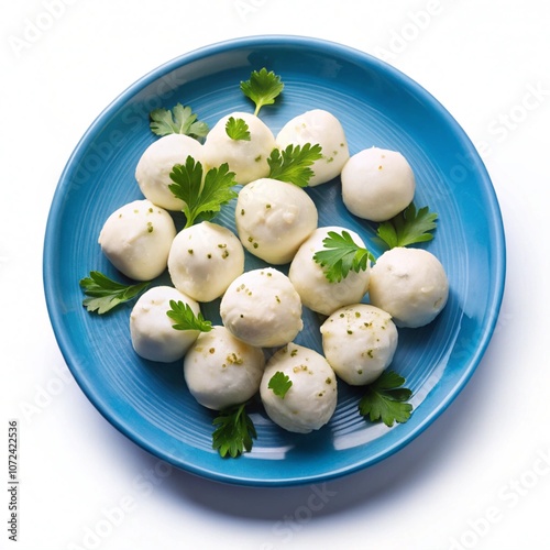 Mini mozzarella balls with parsley isolated 