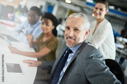 Portrait, man and business people in meeting, opportunity and magazine agency with news room. Office, group and employees with tech, journalist or editing with mature person and research for project