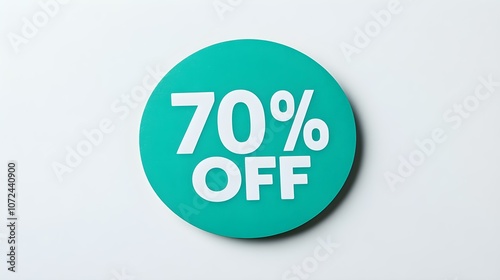 White '70% OFF' Text on a Emerald Round Paper Note. White Background with Copy Space