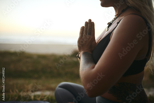 Yoga, prayer hands and person in nature for meditation, spiritual healing and calm to align chakra at space. Woman, posture and outdoor for pilates with zen, mental health balance and stress relief photo