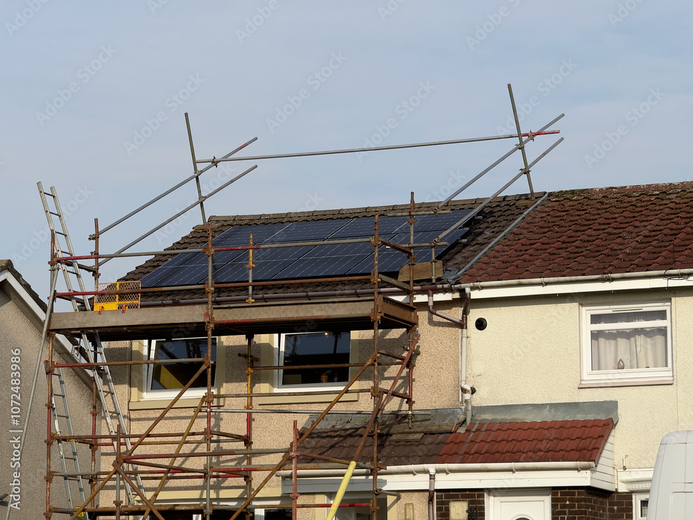 Solar panels installation progress on house Solar panels installation progress on house