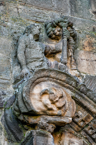 Image of the Cardinal Virtue of the Fortress. Detail of the north facade of the Church of the Assumption in Puertollano, Ciudad Real Province, Spain photo