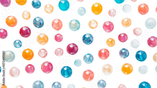 Colorful marbles arranged in a random pattern on a transparent background