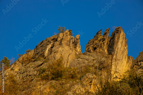 Golden autumn in the forest and mountains along the Donau river in Austria. Wachau region, Vogelberg mountain in the autumn season with yellow and orange leaves on the trees. Yellow leaf on october photo