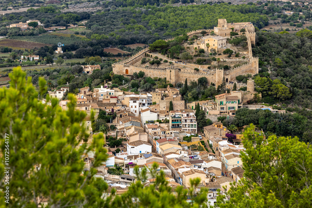 Fototapeta premium The Castle of Capdepra on the hill above the small town of Capdepera, Mallorca, Majorca, Balearic Islands, Spain, Europe