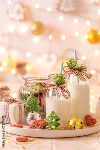 Sweet and tasty gingerbread cookies with milk at Christmas eve.