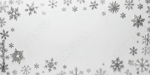 A simple, laconic white winter New Year background 2026 for a banner with a decor of silver snowflakes