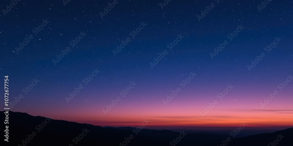 A mesmerizing view of stars moving gracefully in the night sky above majestic mountains, night sky, stars A mesmerizing view of stars moving gracefully in the night sky above majestic mountains, night sky, stars