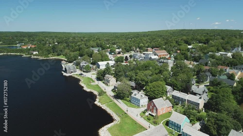 Aerial view of Atlantic Canada's historic Shelburne harbour waterfront, buildings and shoreline park, Nova Scotia, Canada. MAX QUAL PRORES422HQ Transcode of 4K H.265 D-CINELIKE original capture. photo