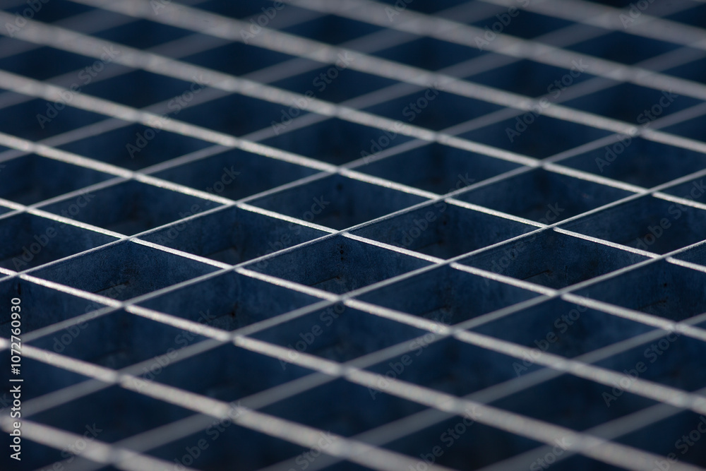 photo of a metal grill with square cells photo of a metal grill with square cells