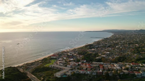 Aerial drone exploration of San Clemente California's coastline at sunset