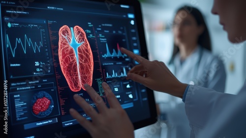 A medical professional interacts with a digital display of lungs, showcasing data and visualizations related to respiratory health.