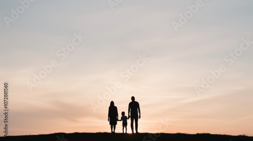 Silhouette of a family at sunset. photo