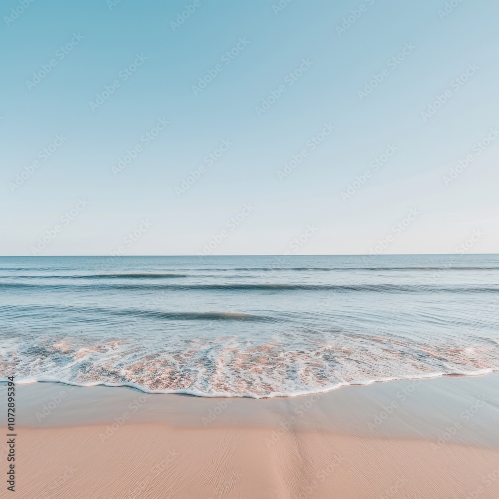Serene beach with gentle waves and clear skies. Serene beach with gentle waves and clear skies.