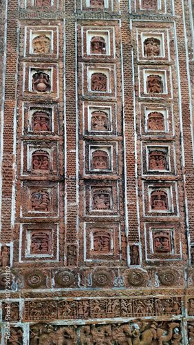 Popular terracotta art portraying hindu mythological stories on Kantajew temple in Bangladesh.Commonly known as Kantaji Temple,is a late-medieval Hindu temple. photo