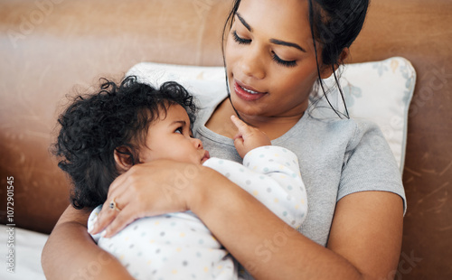 Billede på lærred Mother, baby and cuddle for care, love and nurture in family home or nursery with support for toddler