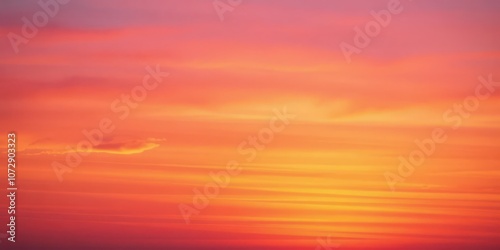 Vibrant and colorful gradient of a beautiful sunset with shades of orange, pink, and purple, tranquil, background