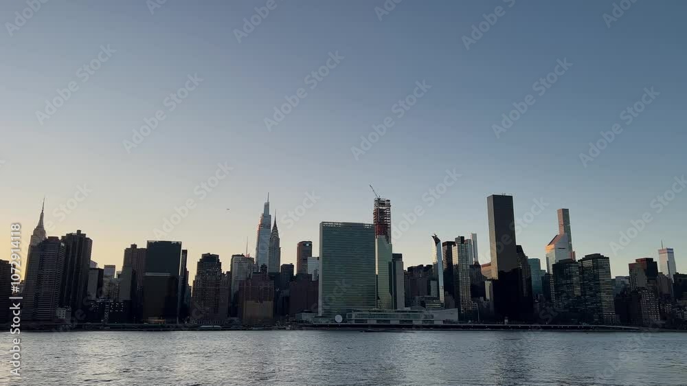 Manhattan Skyline illuminated beautifully at Sunset, a stunning sight