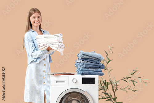 Young woman with stacks of ...