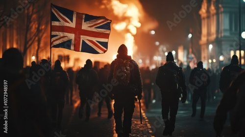 The end of british free speech Censorship, online social media, punishment, rioting,riots. British flag and protestors taking to the streets. marching and unrest photo