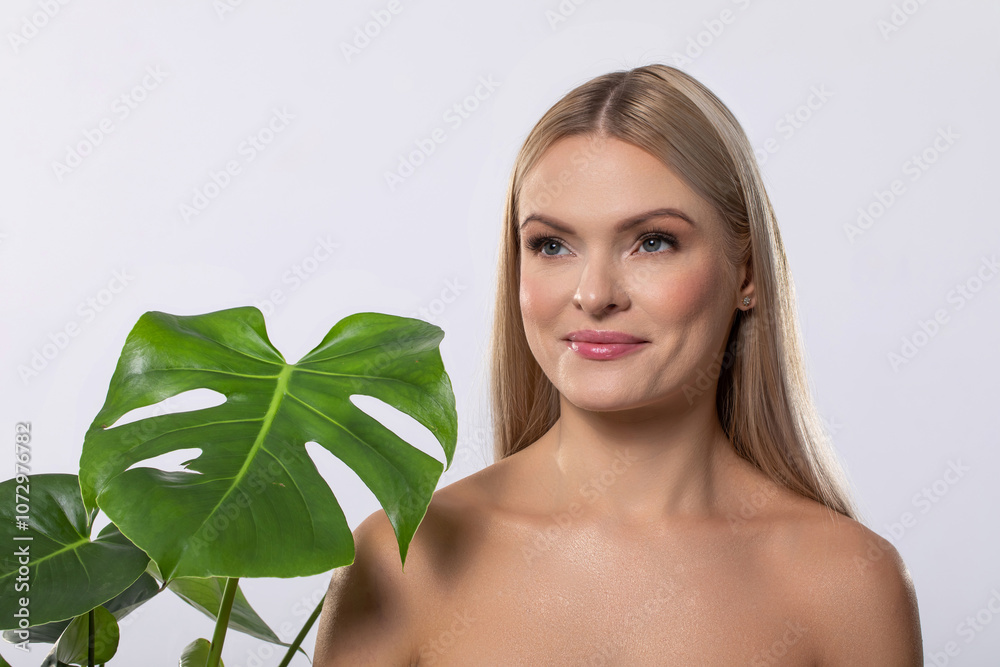 An Elegant and Stunning Portrait Featuring a Monstera Plant Accented with a Glitter Effect