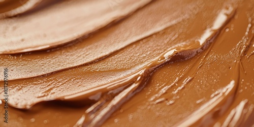 Close-up of foundation being blended into the skin for a flawless finish. photo