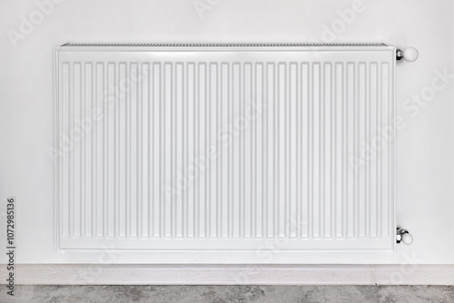 Wallpaper Mural Close-up of a bimetallic heating radiator in an apartment against a white wall. Torontodigital.ca