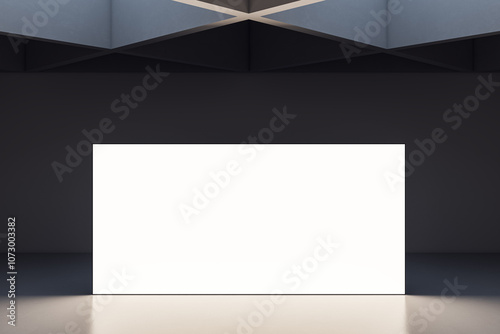 Fototapeta Naklejka Na Ścianę i Meble -  Modern Exhibition Space with Blank Screen on Dark Background. 3D Rendering