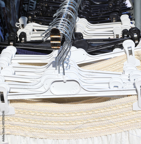 clothing rack with garments for sale at market stall