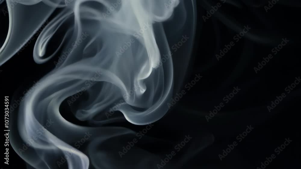 4K Rotation of the smoke veils under the lights on a black background. 4K Rotation of the smoke veils under the lights on a black background.