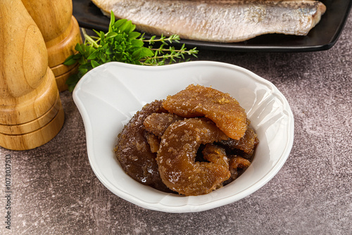 Herring roe snack in the plate photo