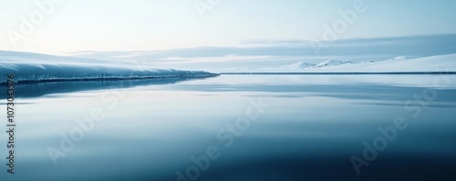 Icy lake with soft ambient light, cold reflections, serene winter scene