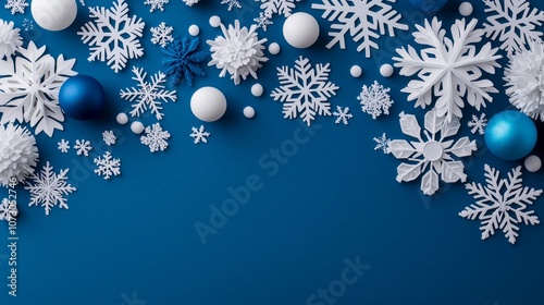 A beautiful arrangement of blue and white decorations with snowflakes, perfect for festive winter celebrations.