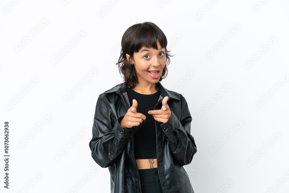 Young mixed race woman isolated on white background surprised and pointing front Young mixed race woman isolated on white background surprised and pointing front