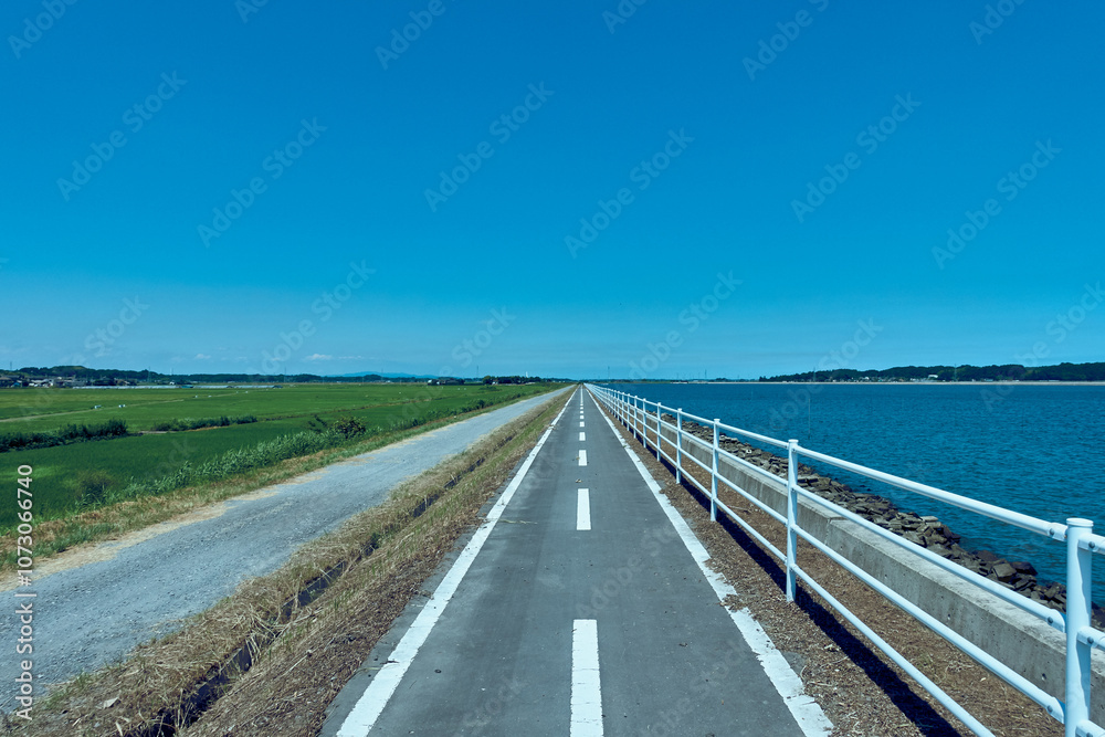 Fototapeta premium Endless River-side Road in Japan
