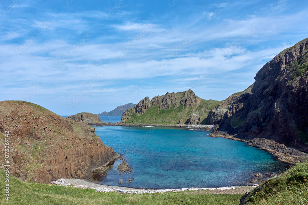 Fototapeta premium Tranquil Bay with Rocky Mountains in Hokkaido