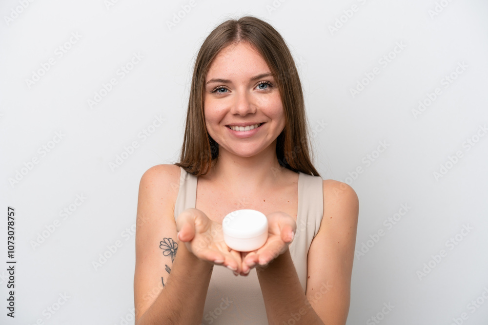 Young Lithuanian woman isolated on white background with moisturizer and offering it Young Lithuanian woman isolated on white background with moisturizer and offering it