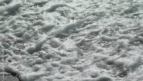 Εκτύπωση καμβά Foam Ocean Wave Closeup: White foam covering the surface of a wave in the ocean